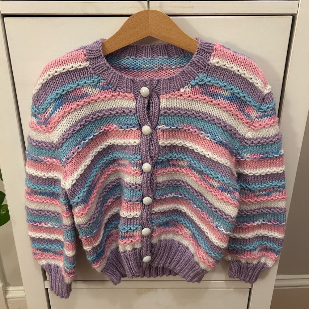 Adorable little girl’s knit sweater